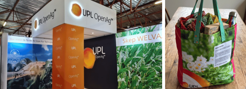 UPL reusable exhibition display alongside a shopper bag upcycled from old textile graphics